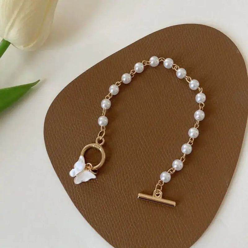 Fluttering Pearl Charm Bracelet